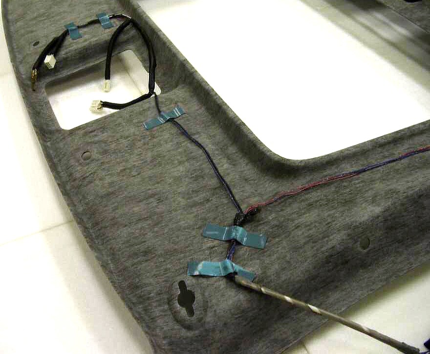 Preinstall of 3M wire harness tapes in headliner