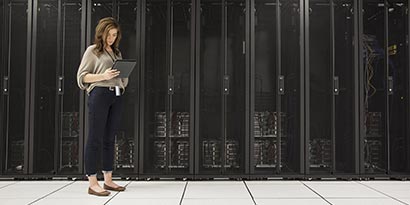Employee in server room
