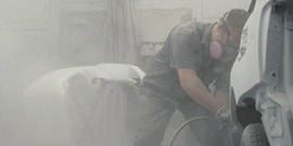 technician sands without dust extraction equipment