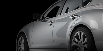 gray scaled photo of exterior of a vehicle
