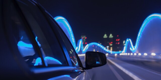 car driving on a road at night