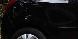 vehicle shows where body filler was applied over paint