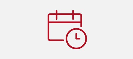 Icon of a clock face overlaying a desk calendar page
