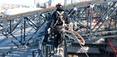 Construction worker wearing 3M™ Safety Glasses.
