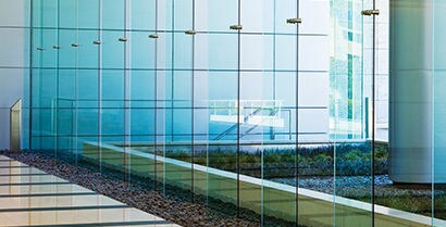 glass wall with a garden
