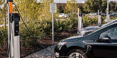 electric vehicle plugged into a charger
