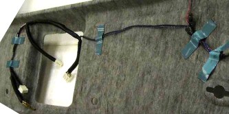 Preinstall of 3M wire harness tapes in headliner
