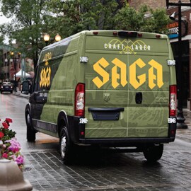 back of a commercial van branded with graphic film for brand recognition.