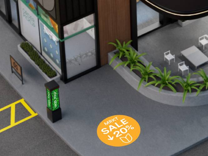 หน้าร้านพร้อมป้ายสว่าง พื้นที่จอดรถ แสดงผนังสีเขียวและรถส่งของ
