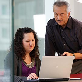 Mentor and intern at computer