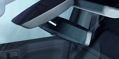 bonded components to glass in an automobile