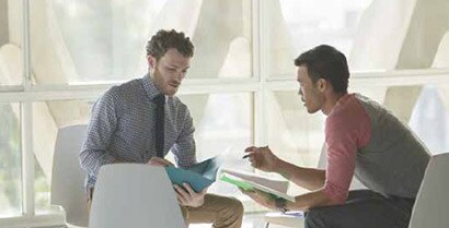 person and person sitting in a room
