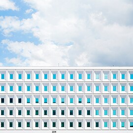 Image of a 3M global headquarters campus building and the sky.