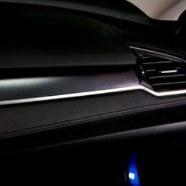 The front dash panel on a car showing where 3M automotive interior trim film would be applied.