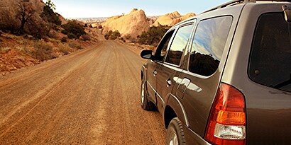 vehicle on a desert road

