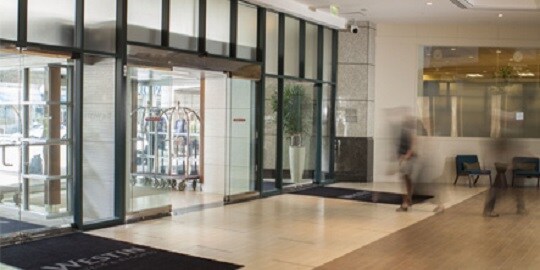 person walking in a hallway

