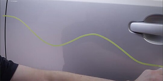 “Put pressure on the entire width of the crepe paper tape while stretching it” as worker use it
