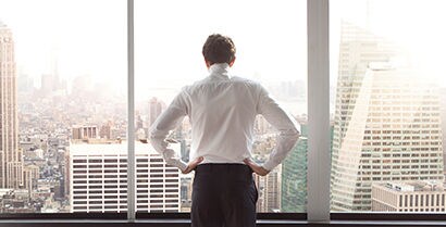 person standing in front of a window
