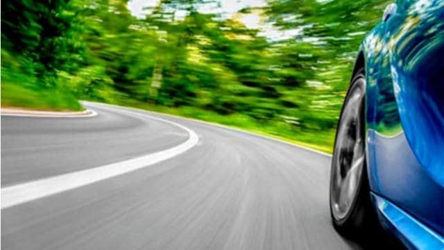 A car driving on a curved road