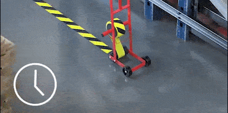 ภาพ GIF ของ 3M™ Lane Marking Applicator อุปกรณ์ติดเทปตีเส้น รุ่น M-1 ขณะติดเทปสีดำและเหลือง
