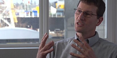 Operation Manager talking to camera
