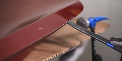 technician doing door skin removal
