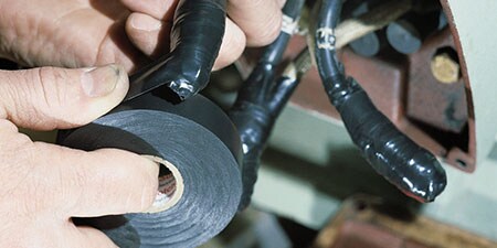 image of 3M vinyl electrical tapes being used on motor leads
